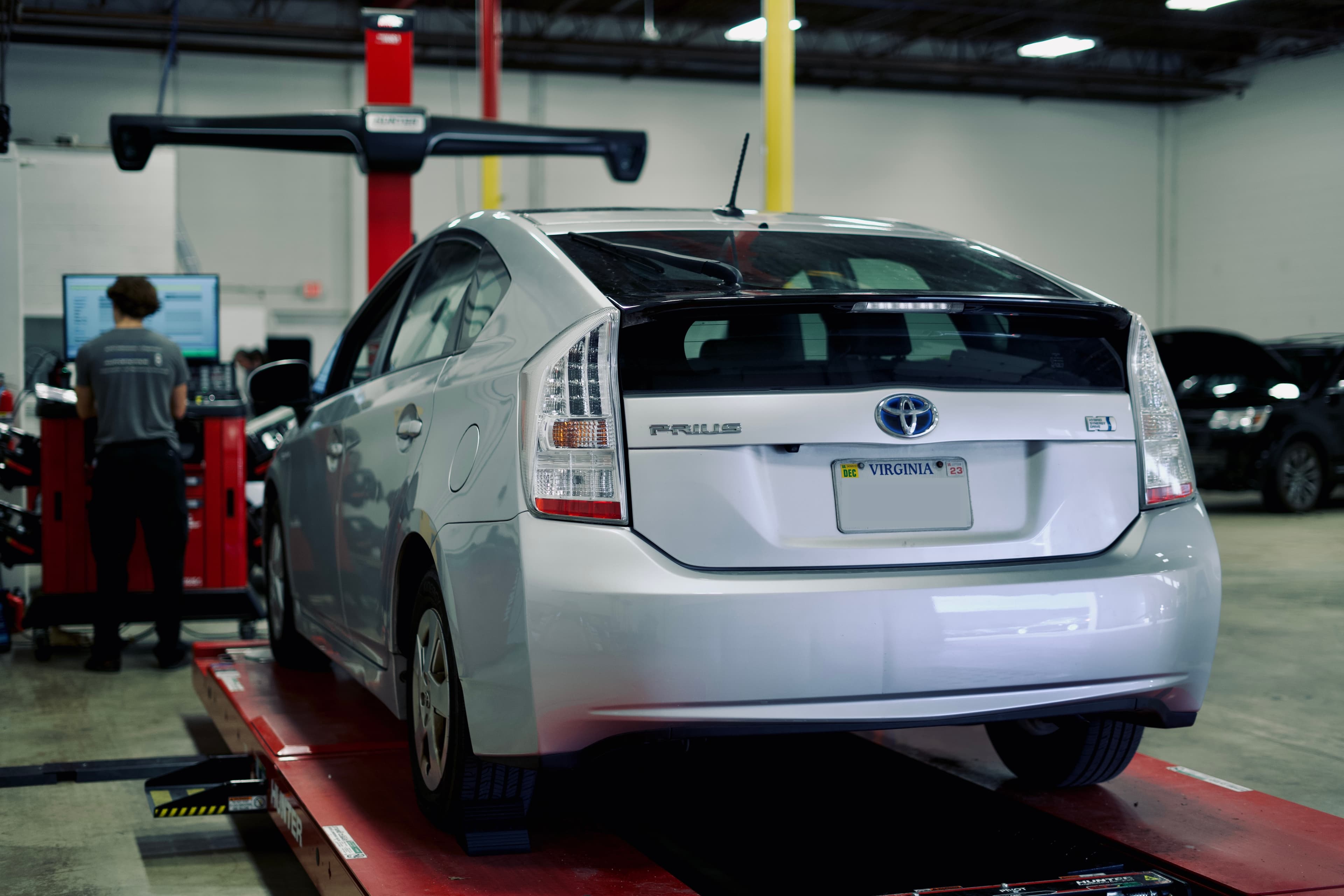 A vehicle on the alignment rack in the Level 5 Solutions shop